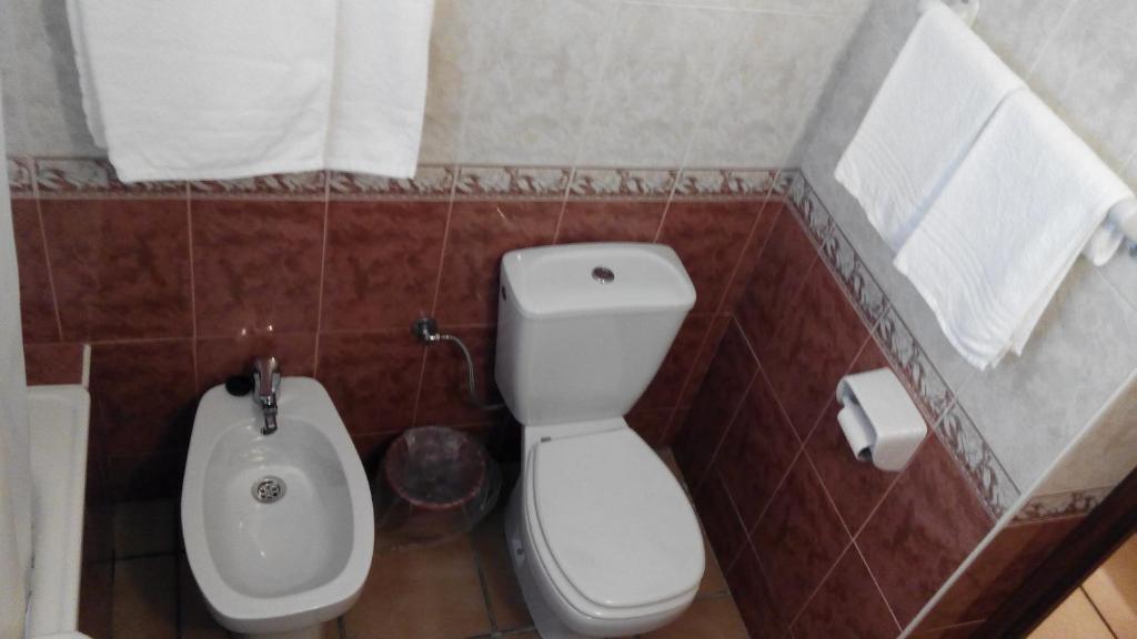 Koupelna v ubytování Hotel Riavela
