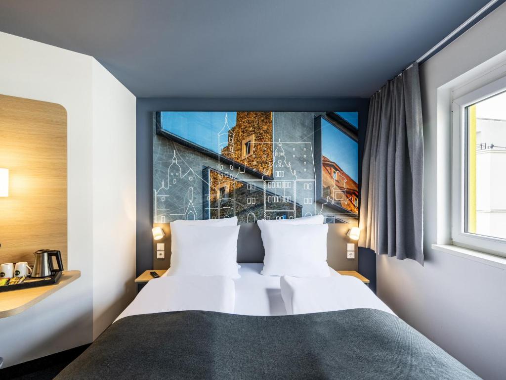 Postel nebo postele na pokoji v ubytování B&B Hotel Schweinfurt-City