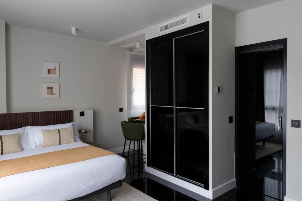 Postel nebo postele na pokoji v ubytování My Suite Madrid