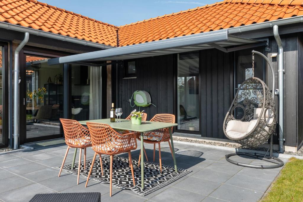 En terrasse eller udendørsområde på Grote Siege 42