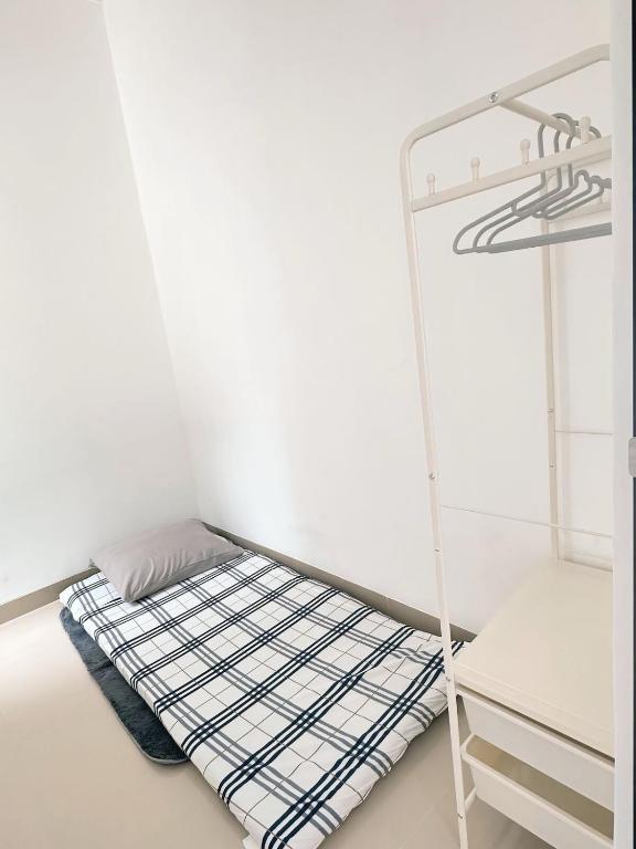 Postel nebo postele na pokoji v ubytování Kino Stay - 3 BR, A Modern Minimalist House
