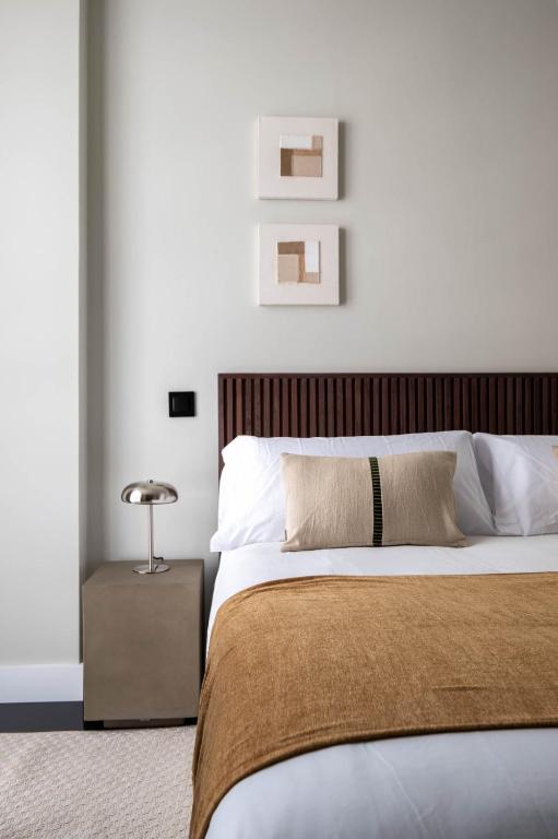Postel nebo postele na pokoji v ubytování My Suite Madrid