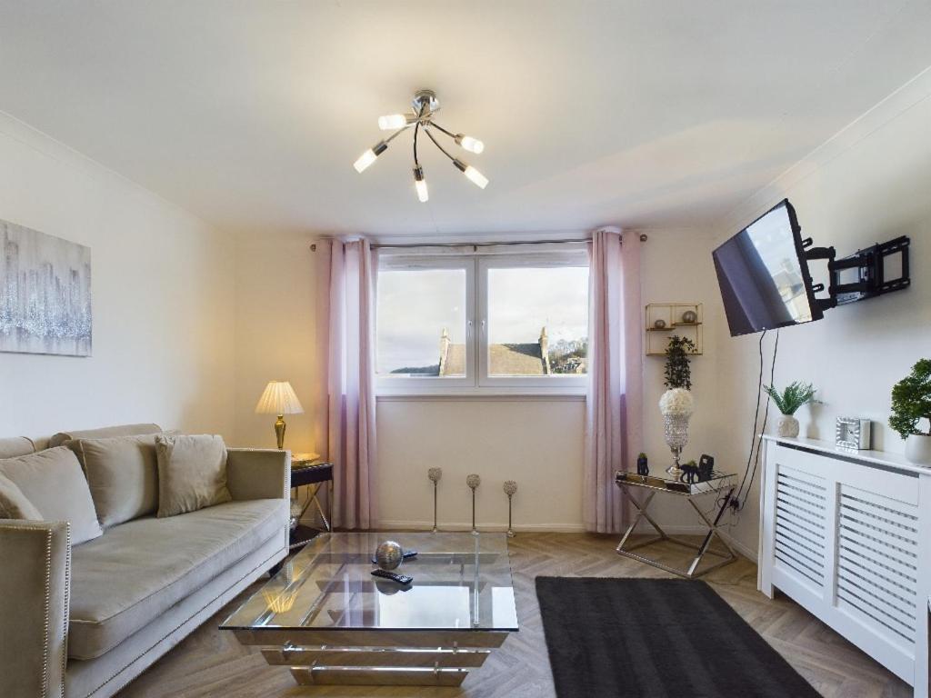 TV a/nebo společenská místnost v ubytování North Bridge Apartment