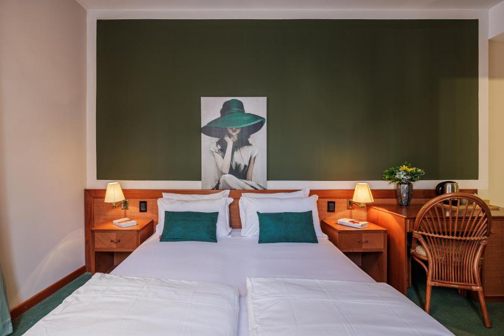 Postel nebo postele na pokoji v ubytování Hotel alla Grotta