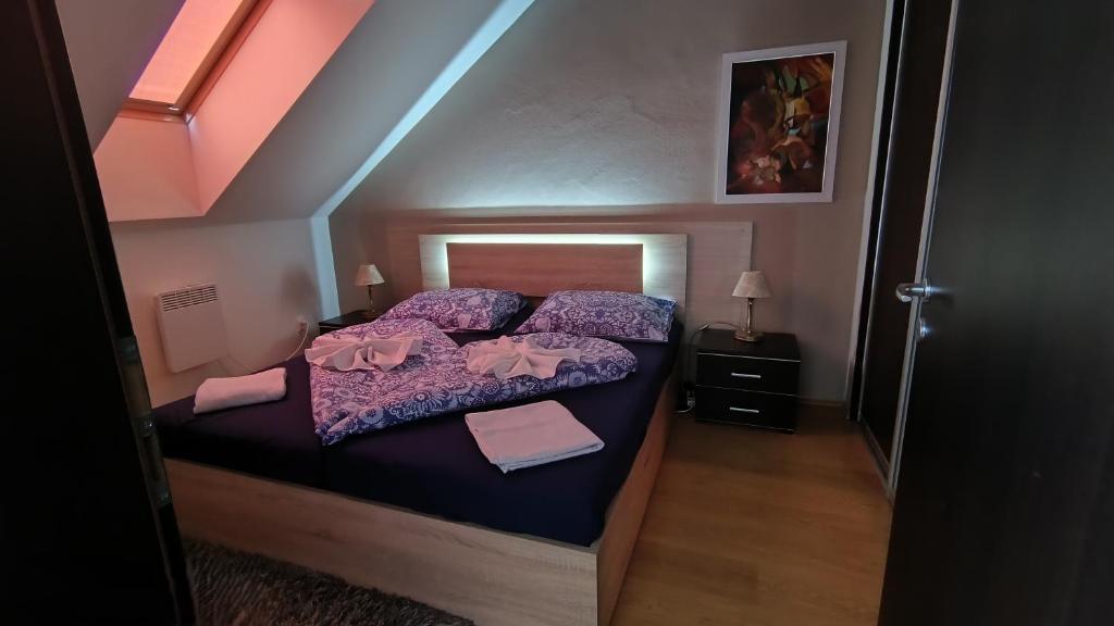 Postel nebo postele na pokoji v ubytování Apartman Paula 1