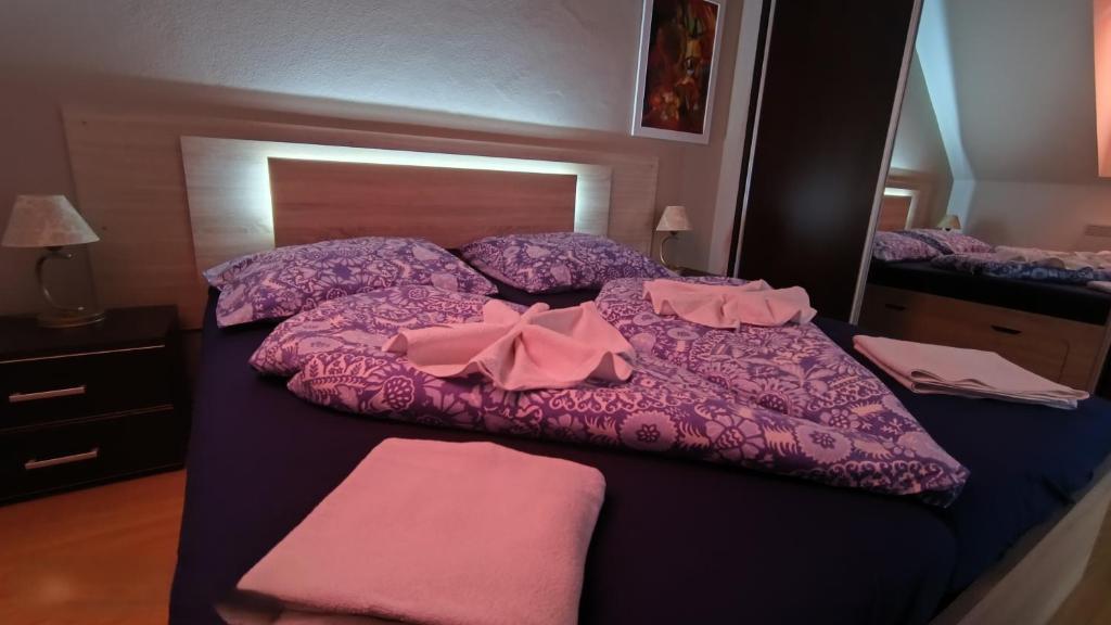 Postel nebo postele na pokoji v ubytování Apartman Paula 1