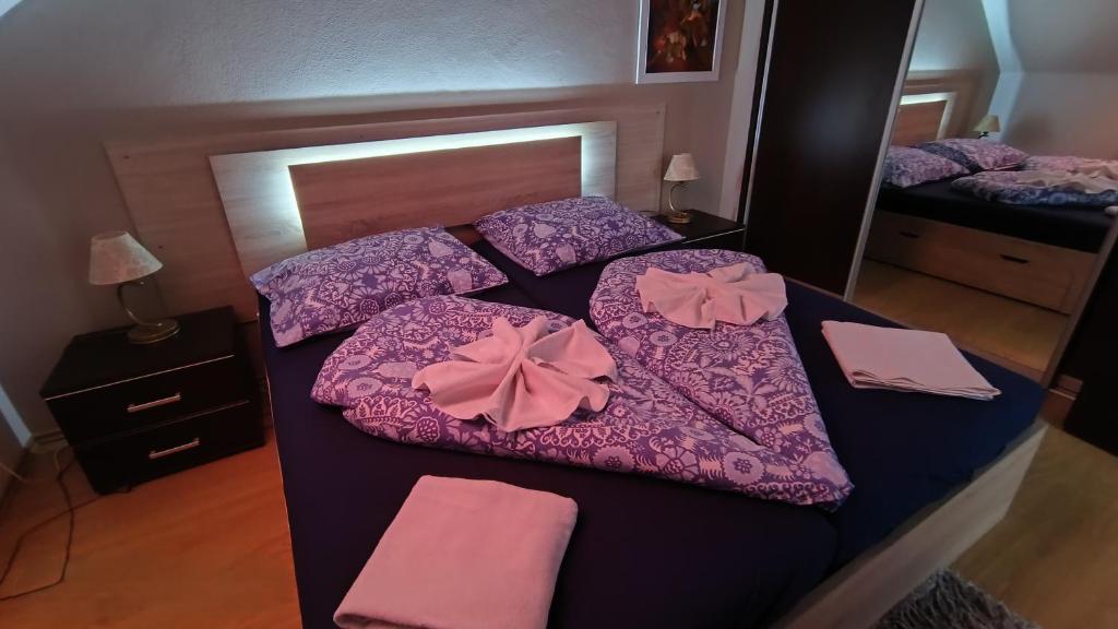 Postel nebo postele na pokoji v ubytování Apartman Paula 1