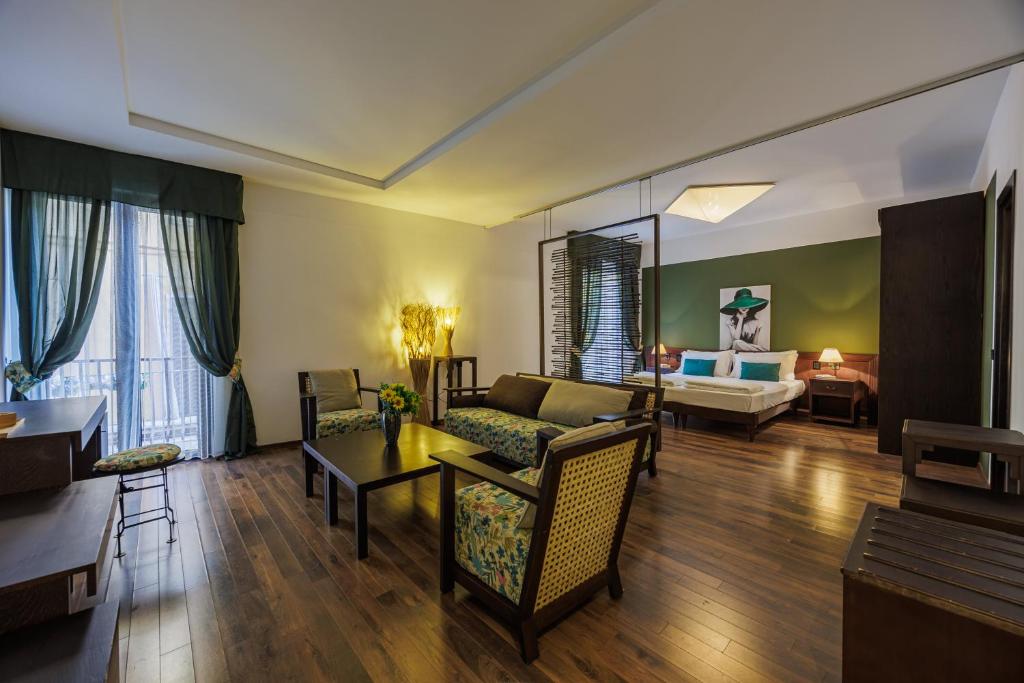 Postel nebo postele na pokoji v ubytování Hotel alla Grotta