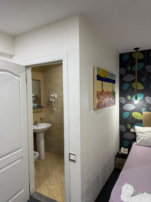 Koupelna v ubytování Garden Inn by NHG