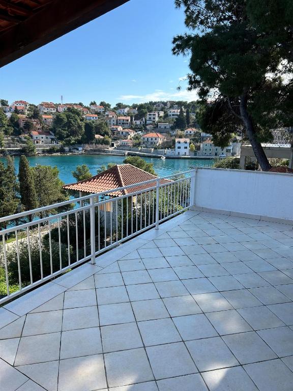 a balcony with a view of the water at Apartment Dino in Splitska