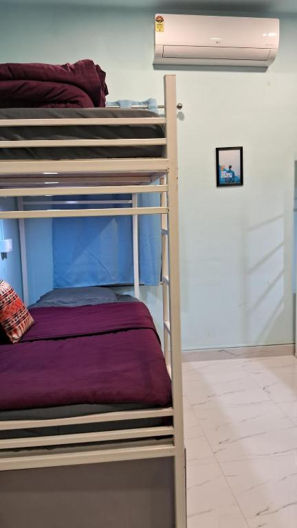Postel nebo postele na pokoji v ubytování Cayzen