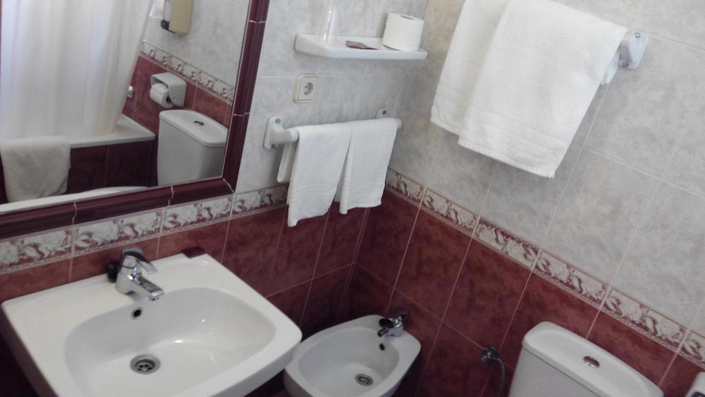 Koupelna v ubytování Hotel Riavela
