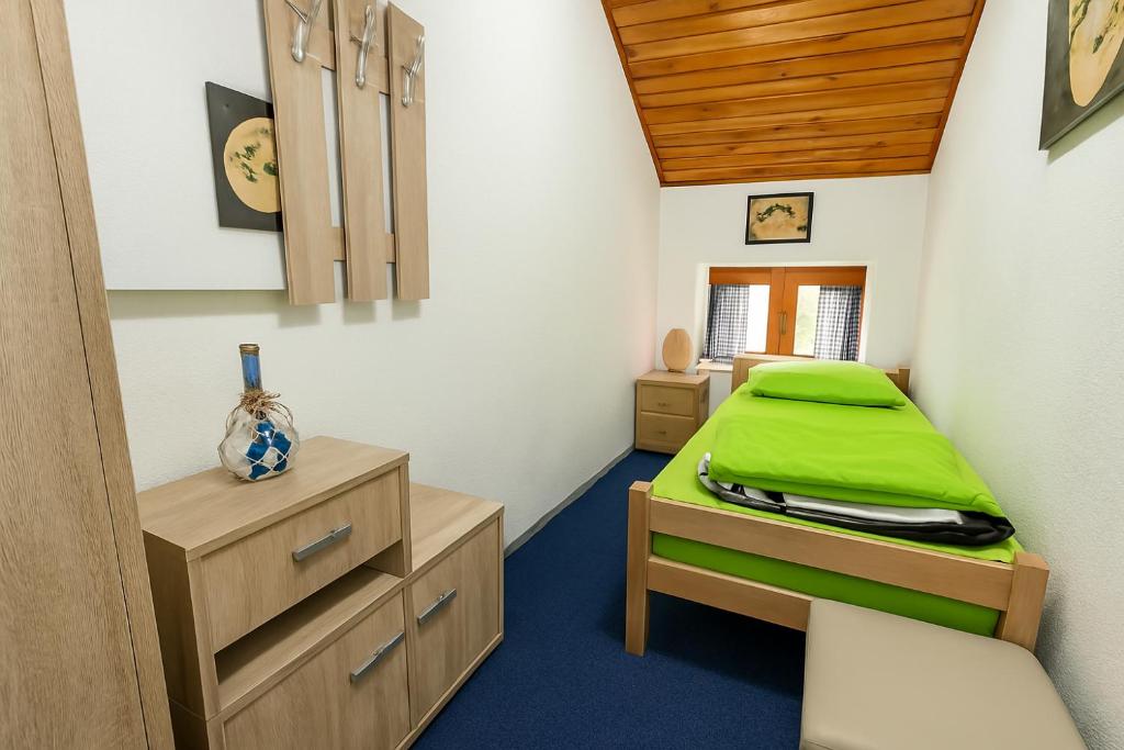 Postel nebo postele na pokoji v ubytování Hostel Mojan
