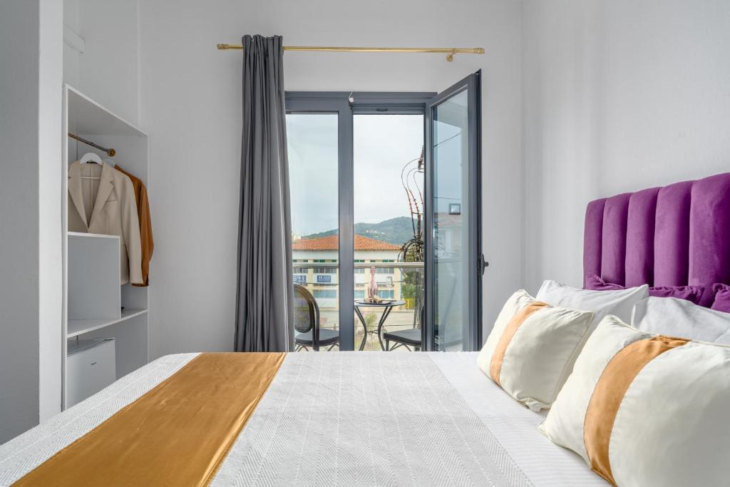 Postel nebo postele na pokoji v ubytování MR P. Boutique Residence