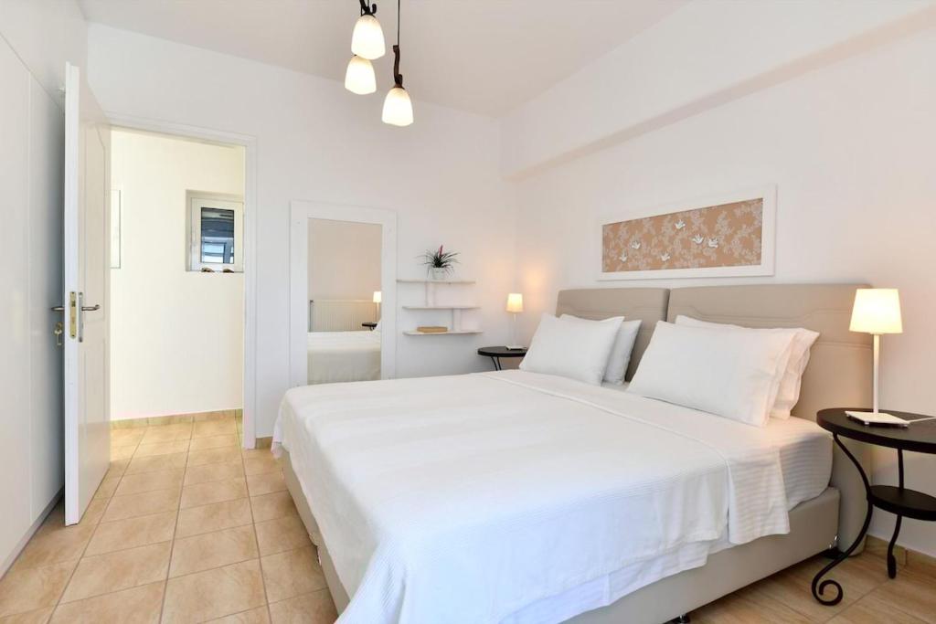Posteľ alebo postele v izbe v ubytovaní DreamCatcher Sea view mini pool Paros