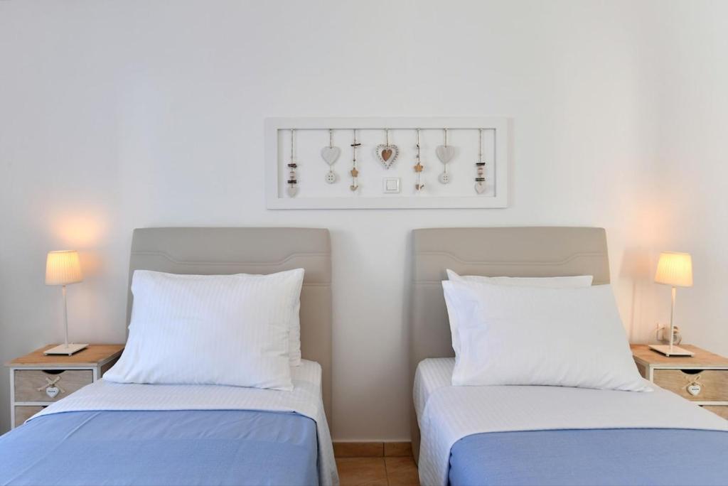 Posteľ alebo postele v izbe v ubytovaní DreamCatcher Sea view mini pool Paros