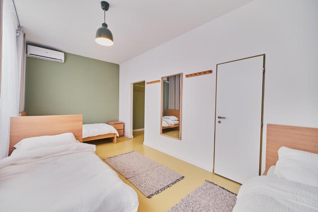 Postel nebo postele na pokoji v ubytování Hostel Prazacka