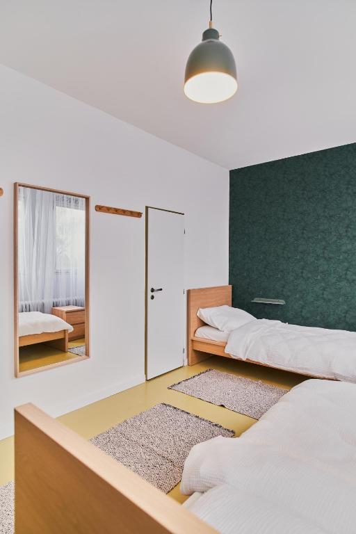 Postel nebo postele na pokoji v ubytování Hostel Prazacka