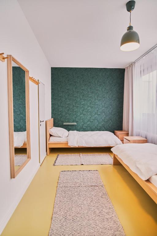 Postel nebo postele na pokoji v ubytování Hostel Prazacka