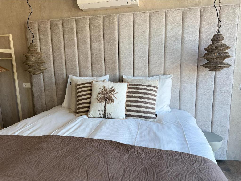 Postel nebo postele na pokoji v ubytování Hotel Biesbosch