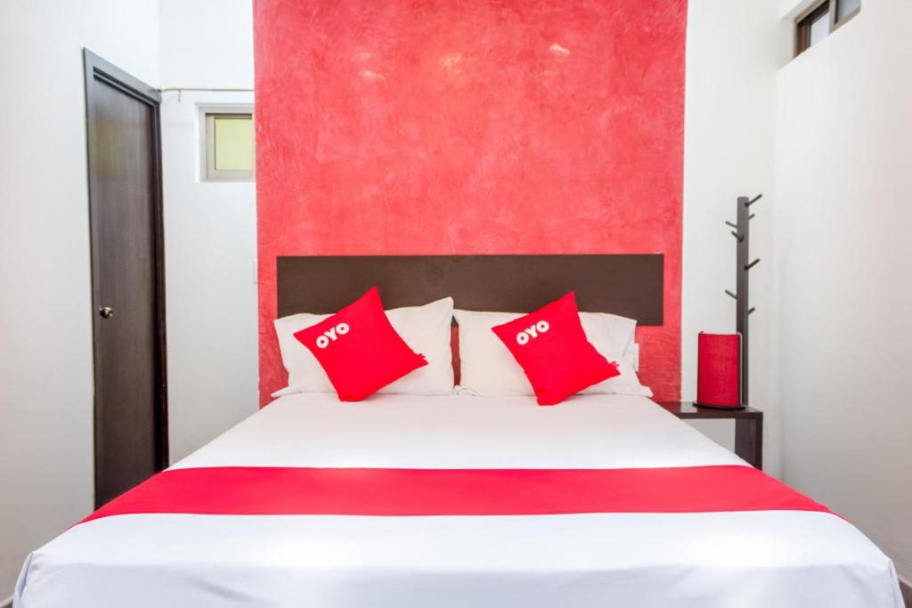Postel nebo postele na pokoji v ubytování OYO Hotel Gandag