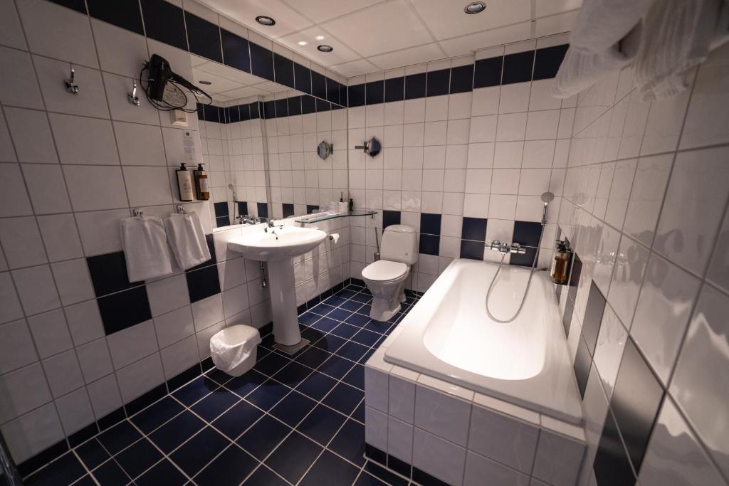 Koupelna v ubytování Hurdalsjøen Hotel & Spa
