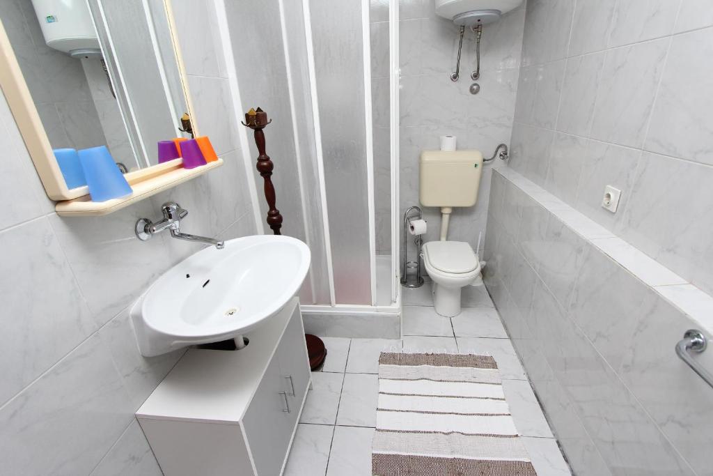 Koupelna v ubytování Apartments Goga