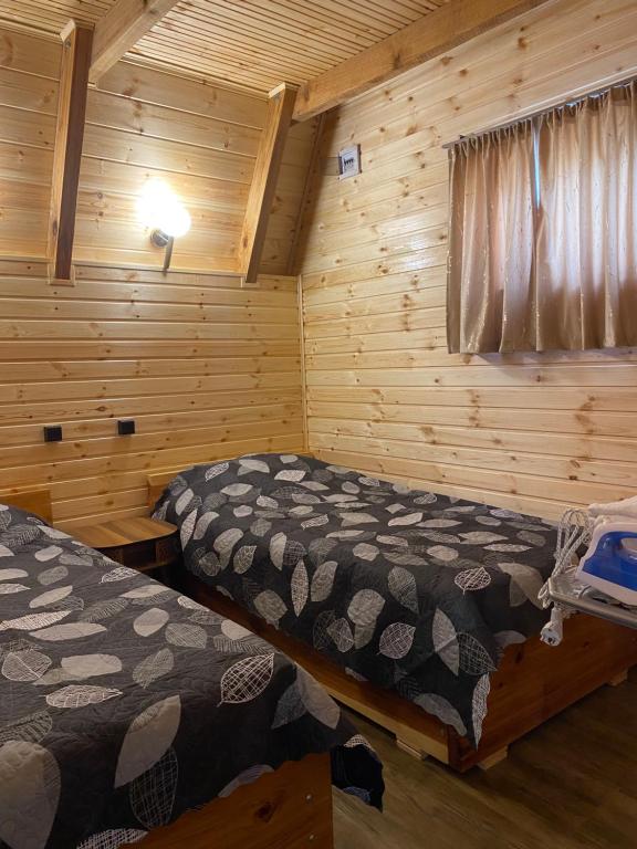 Postel nebo postele na pokoji v ubytování Bondo'S Cottage