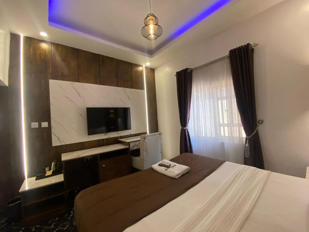 Postel nebo postele na pokoji v ubytování Presken Hotel and Resorts MOJIDI