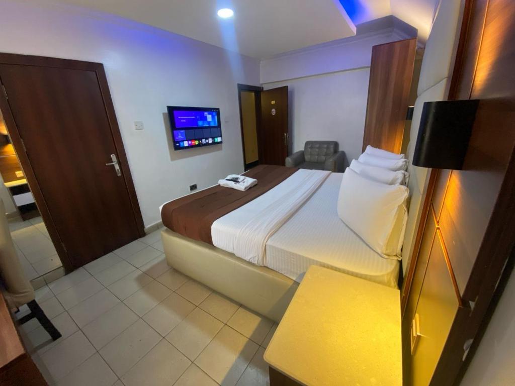 Postel nebo postele na pokoji v ubytování Presken Hotel and Resorts MOJIDI