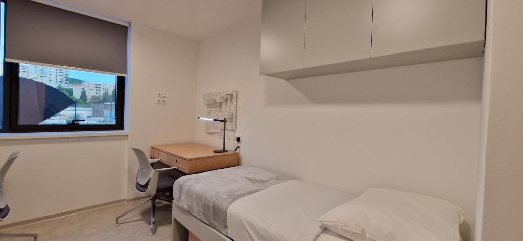 Voodi või voodid majutusasutuse Hostel 'SD Palacin' toas