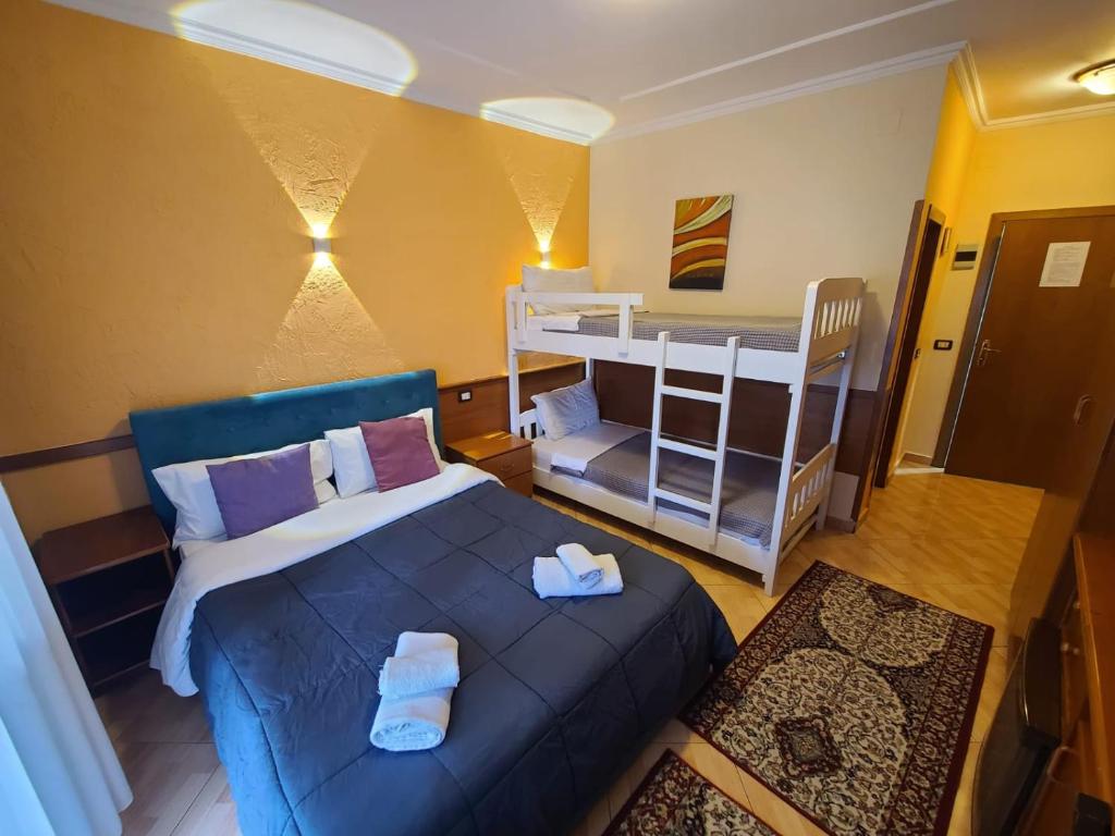 Postel nebo postele na pokoji v ubytování My Rooms Hotel