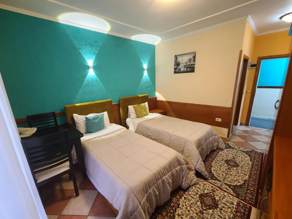 Postel nebo postele na pokoji v ubytování My Rooms Hotel