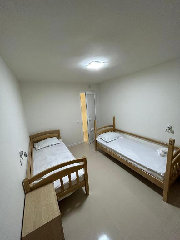 Postel nebo postele na pokoji v ubytování Time Hotel Yerevan