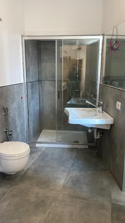 Koupelna v ubytování Hotel Paola