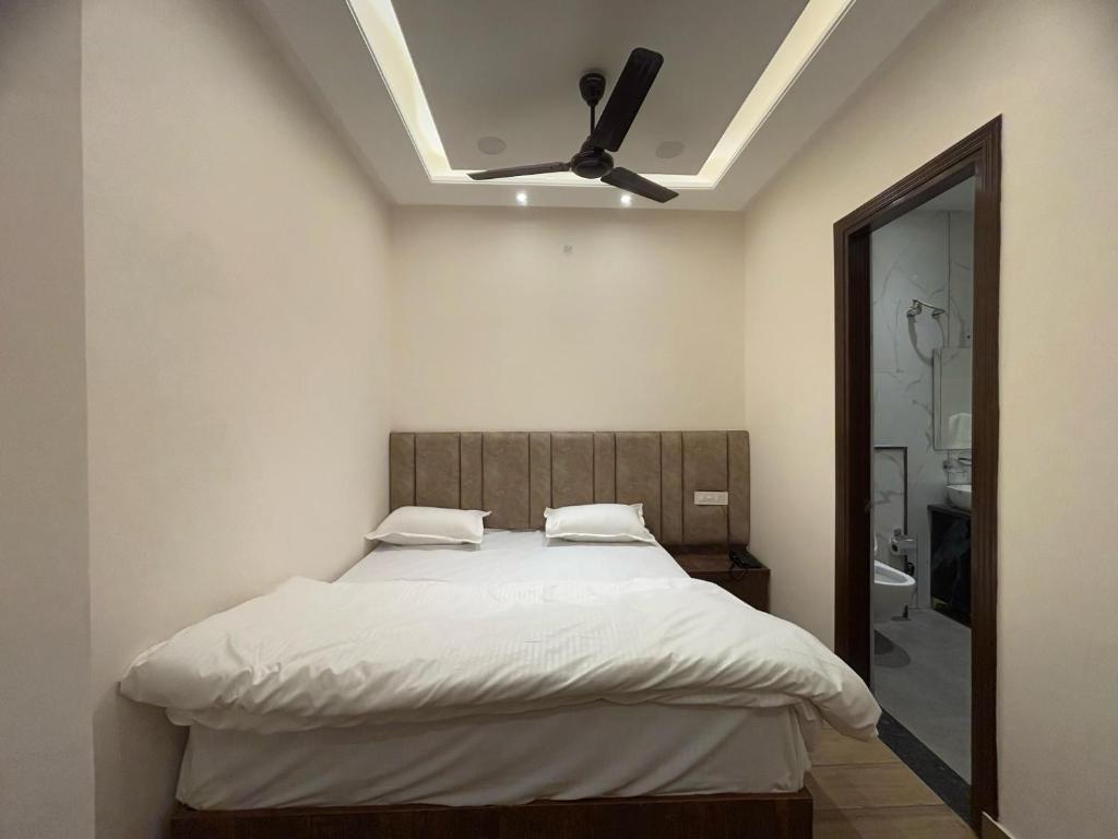 Postel nebo postele na pokoji v ubytování Hotel Moon Light