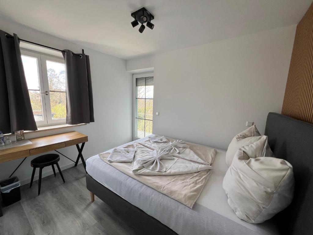 Postel nebo postele na pokoji v ubytování Hotel Bastei