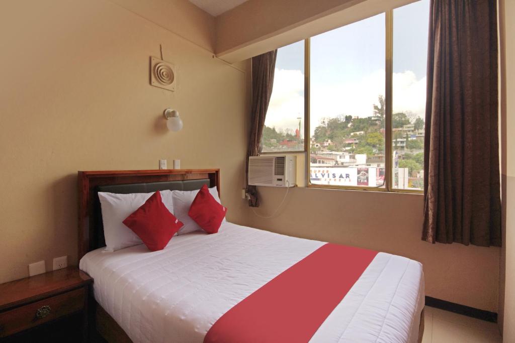 Postel nebo postele na pokoji v ubytování OYO Hotel Totonacapan, Papantla