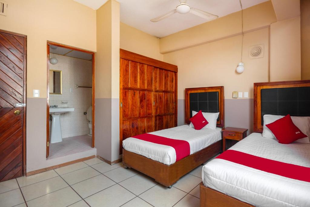 Postel nebo postele na pokoji v ubytování OYO Hotel Totonacapan, Papantla