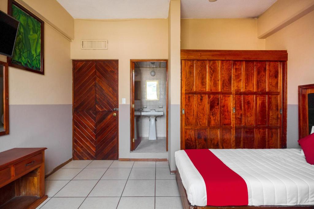 Postel nebo postele na pokoji v ubytování OYO Hotel Totonacapan, Papantla