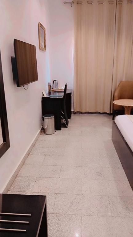 Postel nebo postele na pokoji v ubytování Jades Hotel