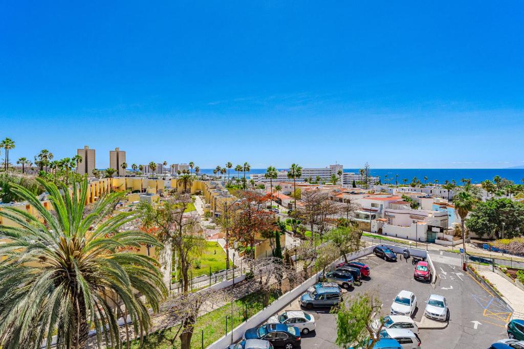 an aerial view of a parking lot next to the ocean at Luz de la Luna - Ocean View - Las Americas in Costa de Adeje