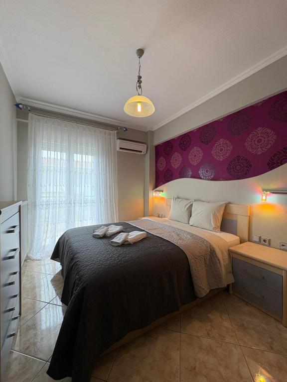 Ένα ή περισσότερα κρεβάτια σε δωμάτιο στο Casa Doro A6