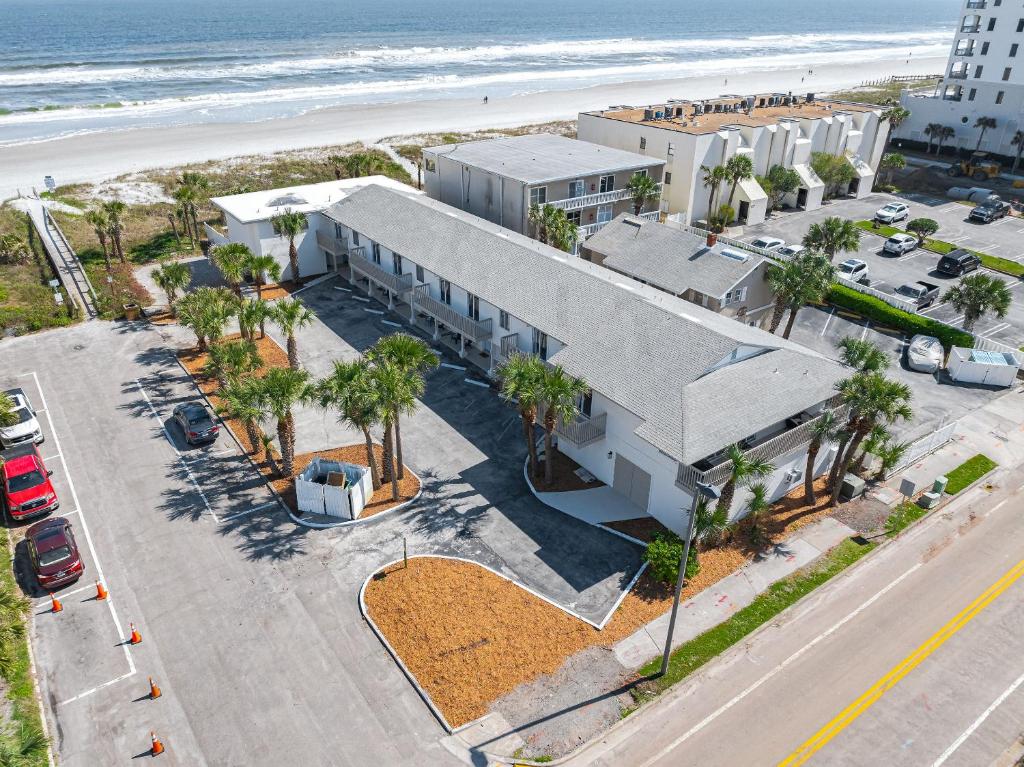 an aerial view of a building at the beach at A Wave From It All Oceanview 2Nd Level Patio in Jacksonville Beach