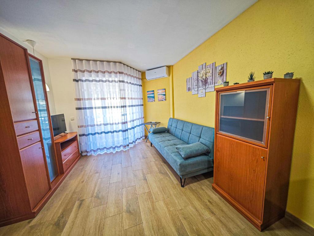 Televízia a/alebo spoločenská miestnosť v ubytovaní LITORAL COSTA DORADA - TUCAN vista mar