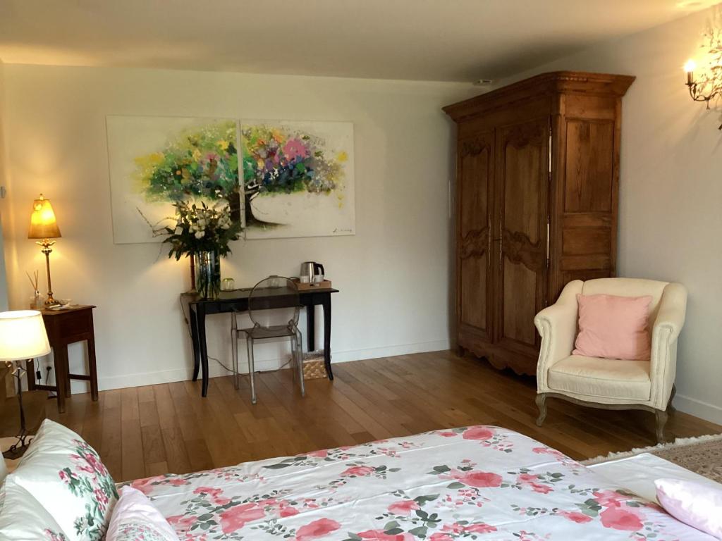 Postel nebo postele na pokoji v ubytování Au Château