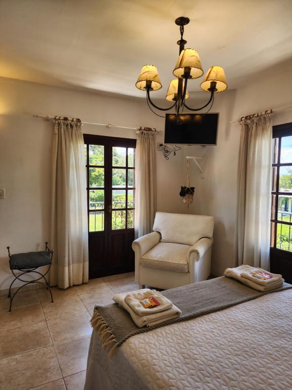 Ένα ή περισσότερα κρεβάτια σε δωμάτιο στο Quinta Loma Alta