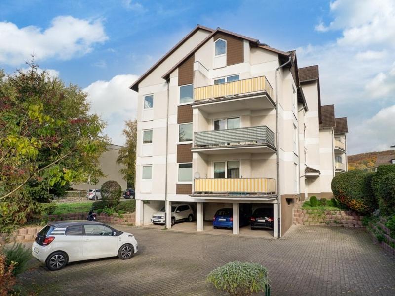 a white car parked in front of a building at Ferienwohnung No 9 in Hameln in Hameln