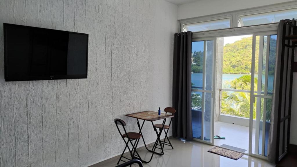 TV a/nebo společenská místnost v ubytování Palma Resort