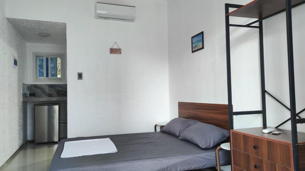 Postel nebo postele na pokoji v ubytování Palma Resort